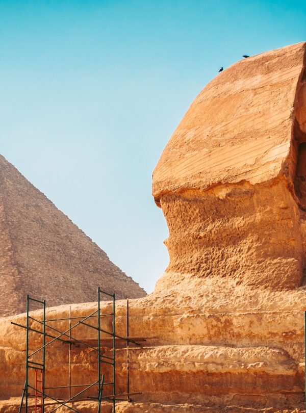 Ancient Sphinx and the great pyramid of Giza in Egypt.