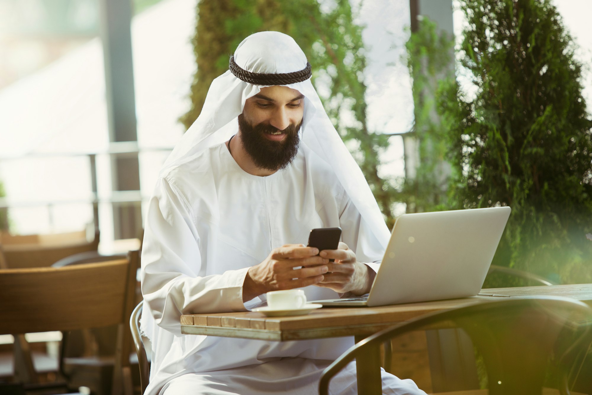 Arabian saudi businessman working outdoors