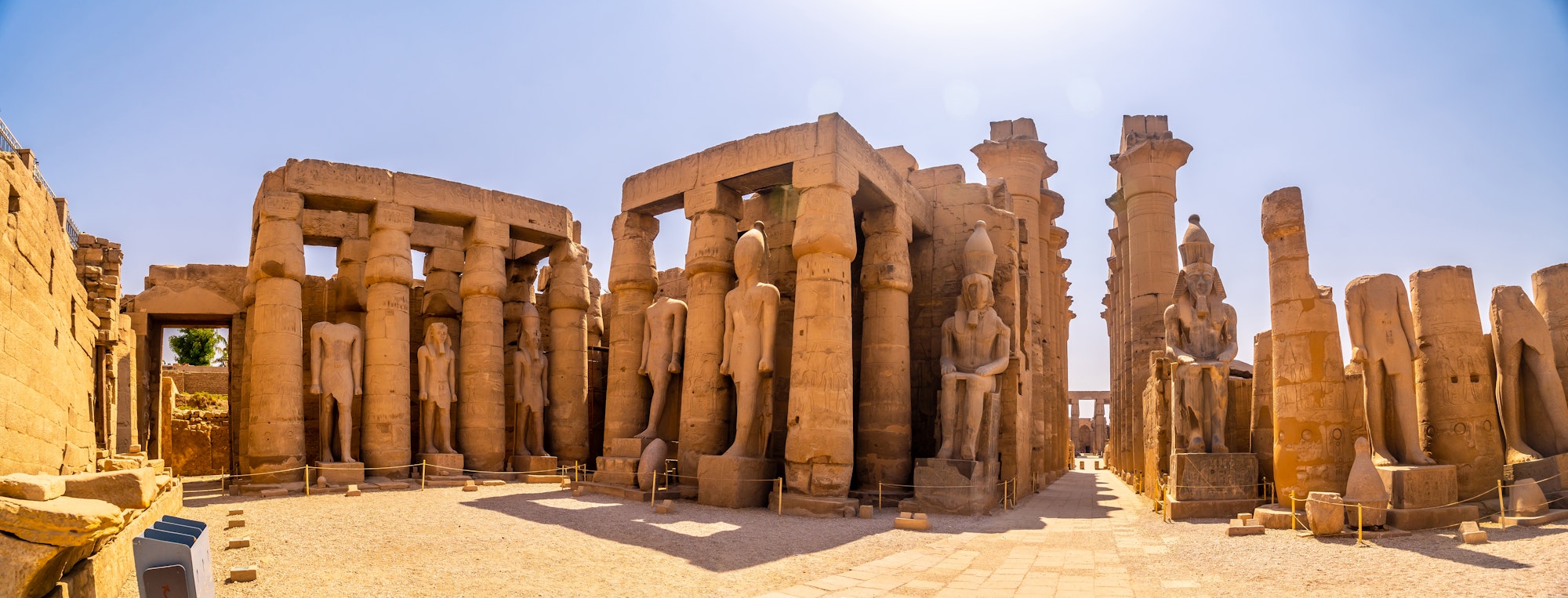 Sculptures of pharaohs and ancient Egyptian drawings on the columns of the Luxor Temple